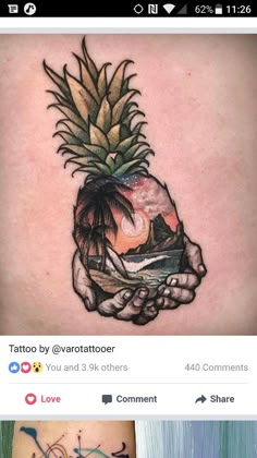 a tattoo on the back of a woman's shoulder with an image of a pineapple