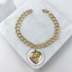 18k Gold Filled 7mm Double Oval Link, Round White Charm, Heart Fe Charms Bracelet Wholesale Jewelry Supplies. The "Fe" words in the charm means "Faith".-Bracelet Size:Oval Chain Thickness: 7.1 mm | Length: 8 inches Luxury Oval Link Charm Bracelet, Faith Bracelet, Wholesale Jewelry Supplies, Charms Bracelet, Wholesale Jewelry, Bracelet Sizes, Jewelry Supplies, Gold Filled, 18k Gold