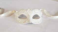 White masquerade mask women with white trim and glitter, simple elegant venetian mask for parties and weddings C U S T O M I Z A T I O N - This mask can be customized with color feather and mask base color! Pick the custom color option and leave a check out note. S H I P P I N G - Processed same White Masquerade Mask, White Masquerade, Masquerade Mask Women, Elegant Face Mask, Couples Masquerade Masks, The Mask Costume, Thank You Wishes, Masquerade Masks, Venetian Mask