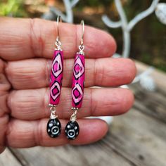 You probably heard me (wherever you are) shout out in delight when I discovered these hot pink bone beads Love the ethnic designs and of course the hot pink color.  I've added complimentary black Czech glass bead dangles.  EEEOOOWWWW Talk about statement earrings! And LIGHTWEIGHT too.   These gorgeous earrings are 2 1/4 inches in length, including the silver plated ear wire hooks.  Just over 1/4 inch wide.   Handmade. One of a kind design. Smoke free artist studio. Pink Bohemian Hand Painted Jewelry, Bohemian Pink Drop Earrings, Bohemian Teardrop Pink Earrings, Pink Bohemian Drop Earrings, Pink Teardrop Earrings For Beach, Unique Pink Teardrop Earrings, Bohemian Pink Hand Painted Earrings, Pink Teardrop Bohemian Jewelry, Bohemian Pink Teardrop Jewelry