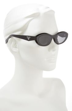 A dramatic oval shape lends distinction to these slender Italian-crafted sunglasses. 56mm lens width; 15mm bridge width; 145mm temple length 100% UV protection Plastic lenses Acetate Made in Italy Beach Formal, Valentino Sunglasses, Sunglasses Outfit, Unique Sunglasses, Gift Inspo, Fashion Eye Glasses, Prada Eyewear, Prada Sunglasses, Oval Sunglasses