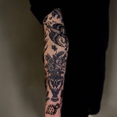 a person with a tattoo on their arm