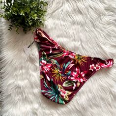 This Pair Of Bikini Bottoms Are Gorgeous In Person! The Colors Are Beautiful And The Print Screams Summer Time Fun! These Bikini Bottoms Can Pretty Much Go With Any Style Top. Brand New Without Tag. Stretch Beachwear Swimwear For Holiday, Holiday Swimwear With Floral Print, Tropical Swimwear For Holiday Beach Season, Tropical Print Swimwear For Holiday Beachwear, Tropical Print Swimwear For Holiday Vacation, Floral Print Beachwear Swimwear For Holiday, Printed Swimwear For Holiday Beach Season, Tropical Multicolor Swimwear For Holiday, Hawaiian Swimwear For Holiday Vacation