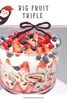 a trifle with strawberries and blueberries in it