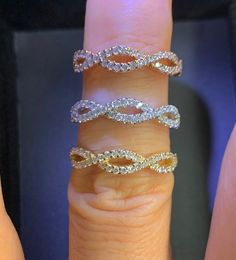 Infinity Diamond Band in white yellow or rose gold. Perfect to wear on its own or stack with another ring. Show her you love her for infinity with this ring. Measures 4.25mm width in center and tapers down smaller. Rose gold & white gold sold out, can be special order takes 2-3 weeks. Natural round brilliant cut diamonds total weight: 0.40 Carats Clarity: SI Color: G/H White and sparkling diamonds 14K Solid Gold your choice in Rose, Yellow, or White Gold ) (white Sold out) Stock Ring Size 6 Rose Gold Infinity Stackable Wedding Rings, Infinity Stackable Rings For Wedding, Infinity Stackable Wedding Rings, Anniversary Infinity Eternity Band Stackable, Modern Twist Infinity Diamond Wedding Ring, Infinity Diamond Eternity Band For Wedding, Diamond Eternity Band With Infinity Design For Wedding, Stackable Infinity Wedding Rings, Stackable Infinity Rings For Weddings