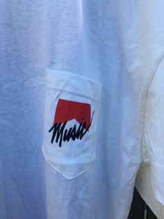 This is an amazing vintage Marlboro music shirt that is ready to make your life awesome. It has never been worn and is ready to go. It has no rips, holes, stains or smells. Measurements: Pit to pit: 24 inches Collar to bottom front: 27 1/2 inches Collar to bottom back: 30 inches Size on tag: XL 90s Streetwear Tops With Pockets, 90s Style Streetwear Tops With Pockets, Cowboy Rodeo, Vintage Vans, Small Photos, Pocket Tee, Horse Riding, Blue Shorts, Rodeo