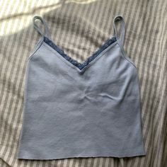 Brandy Melville Blue Lacey Tank Top!! Never Worn, New Without Tags!! No Stains, Rips, Or Pilling!! Send Me Offers Or Message Me To Negotiate!! Light Blue Stretch Camisole Top, Blue Stretch Camisole Top, Blue Cotton Cami Top, Blue Spring Camisole Top, Blue Camisole Top For Spring, Blue Cami Top For Spring, Light Blue Cotton Casual Camisole, Light Blue Casual Cotton Camisole, Light Blue V-neck Camisole For Spring