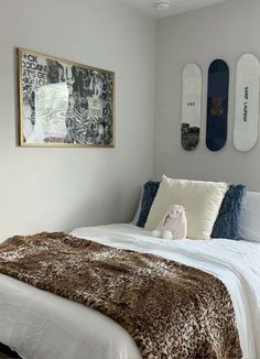 a bedroom with two skateboards mounted to the wall