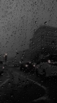 rain drops on the windshield of a car