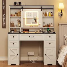 a white desk with drawers and lights on it