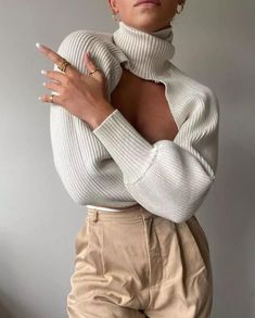 The Allegra Top features a cutout turtleneck with long balloon sleeves. Ribbed trim and crafted from soft knitted fabric. Wear it under your sports bra for an early morning workout or a tank top and jeans for a street style look.   CONTENT + CARE Polyester/Spandex Machine wash cold SIZE + FIT True to size