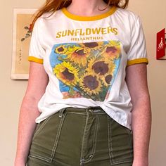 Super Cute Sunflower Tee! No Damages & Never Worn. Size Large But Can Fit A Small-Medium If You Tuck It In! Make Me An Offer! Yellow Retro T-shirt For Summer, Retro Yellow T-shirt For Spring, Yellow Plant Print Summer Top, Fitted Sunflower Print Top For Spring, Yellow T-shirt With Plant Print For Summer, Urban Outfitters Cotton Tops With Floral Print, Yellow Graphic Tee With Floral Print, Fitted Casual Top With Sunflower Print, Urban Outfitters Yellow Cotton Top