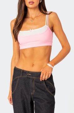 This soft cropped cami is crafted from stretch cotton and designed in a layered silhouette. Scoop neck Adjustable straps 95% cotton, 5% spandex Machine wash, dry flat Imported Y2k Stretch Cami Crop Top, Pink Crop Top With Built-in Bra, Cropped Cotton Tops With Built-in Bra, Scoop Neck Crop Top With Built-in Bra For Spring, Cotton Cami Crop Top With Built-in Bra, Y2k Cami Crop Top With Straps, Y2k Style Cami Crop Top With Straps, Spring Scoop Neck Crop Top With Built-in Bra, Spring Cotton Camisole, Bra Friendly