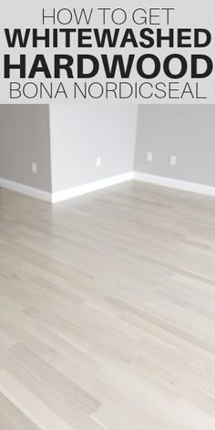 an empty room with hardwood floors and whitewashed hard wood flooring