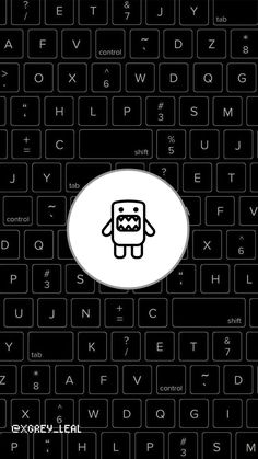 an image of a computer keyboard with a cartoon character on the keypad, which appears to be black and white