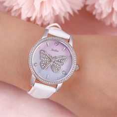 This is a unique butterfly design printed on the dial of this watch to add a touch of sophistication. Centre stage is our silver butterfly encrusted with shimmering stones and framed by sparking markers on a beautiful ombre dial of pale pink fading into sage. Finished with a white leather strap, this timepiece and its muse are truly one of a kind.Watch Strap Color: WhiteStrap Inner Circumference: 175+/-5 mmStrap Width（mm）: 16 Strap Material: LeatherClasp Type: BuckleCase Size: 41.76 mmCase Thick White Diamond Watch Gift, White Watches With Diamond Hour Markers As Gift, White Diamond Watch With Metal Dial For Gift, Unique Butterfly, Rainbow Butterfly, Centre Stage, Silver Butterfly, Butterfly Design, Watch Strap