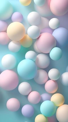 an abstract background with pastel colored balls floating in the air