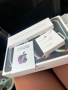 an apple product is in its box on the seat