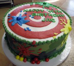 a birthday cake decorated with an image of captain america