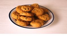 a plate filled with cookies on top of a table