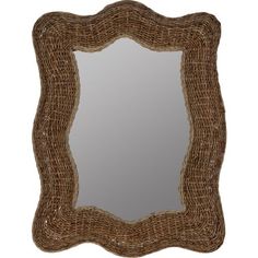 a mirror that is made out of wicker and has a frame in the shape of a