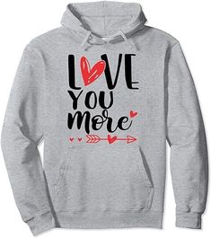 a gray hoodie with the words love you more on it and an arrow in the middle