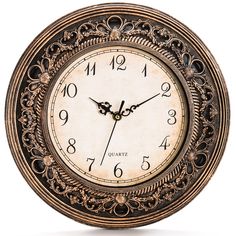 an ornate clock with roman numerals and numbers on the face is shown against a white background