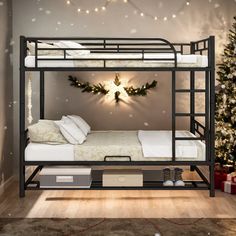 a bunk bed with a christmas tree in the background