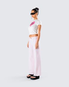 Taking “I woke up like this” to a new level in this two-piece set 💖🙌 Featuring a white jersey graphic top paired with pink stripe drawstring pants, this look will guarantee that you slay every waking moment 😏 White Sporty Sleepwear With Relaxed Fit, Sporty Pink Summer Sleepwear, Trendy White Cotton Sleepwear, Trendy White Sleepwear For Loungewear, Trendy Pink Cotton Sleepwear, Trendy Pink Relaxed Fit Sleepwear, Graphic Top, White Jersey, Cargo Pant