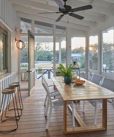 a wooden table sitting on top of a hard wood floor