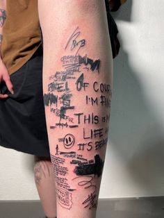 a person with some writing on their leg