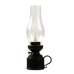 a black table lamp with a clear glass bulb on it's side and a black base