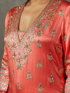 Editor's Note Elevate your ethnic elegance with our coral/pink ari-hand embroidered arin kurta set, including bottoms and a matching dupatta. This ensemble features intricate hand embroidery, making it the perfect choice for special occasions and festive celebrations, exuding timeless charm and style. Color: Pink Fabric: Silk satin Components: Kurta, pants and dupatta Occasion: Festive Note: Product colour may slightly vary due to photographic lighting sources Care: Dry clean only About the Desi Transitional Straight Kurta Palazzo Set With Intricate Embroidery, Party Palazzo Set With Straight Kurta And Intricate Embroidery, Pink Chinon Sets With Zari Work, Pink Unstitched Suit With Intricate Embroidery For Party, Pink Churidar With Intricate Embroidery And Long Sleeve, Pink Straight Kurta Sets With Dabka Detail, Pink Straight Kurta Set With Dabka, Pink Long Sleeve Churidar With Intricate Embroidery, Pink Sets With Dabka Work For Eid