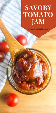 a spoon full of tomato jam on top of a wooden table