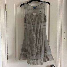 Anthropologie Beach Cover-Up Dress. Designer Name Frlewette See Photos. One In Size Small One In Size Extra Small Color Gray Please Note That The Extra Small Has A Stain I Am Sure It Can Come Out Once You Wash It. Not Sure If This Is Due To The Hanger Or Not. Sheer Sleeveless Elegant Dress For Spring, Summer Silk Midi Dress With Sheer Details, Sheer Mini Dress For Summer Garden Party, Casual Silk Vacation Dress, Casual Silk Dress For Vacation, Casual Evening Dresses For Beach Season, Sheer Sleeveless Sundress, Lined Sleeveless A-line Dress For Summer, Casual Sheer Mini Dress For Beach