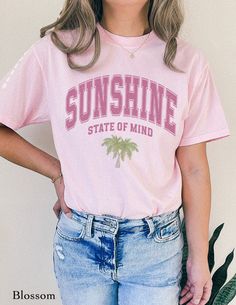 Sunshine State Of Mind With Palm Trees Trendy Graphic Tee. Design is intentionally distressed for a vintage look. SIZING & MATERIALS: Printed on Unisex Comfort Colors c1717 garment-dyed t-shirt for a relaxed fit; the fabric brings extra coziness to your wardrobe while the relaxed fit makes it an excellent daily choice.  .: 100% ring-spun cotton .: Medium fabric (6.1 oz/yd² (206.8 g/m *Sizing up 1-2 sizes gives an oversized look* Please compare measurements against our size chart for your perfect Pink Distressed Summer T-shirt, Pink Distressed T-shirt For Summer, Trendy Distressed Summer Tops, Trendy Distressed Tops For Summer, Spring Text Print Shirt For Summer, Vintage Text Print Tops For Summer, Text Print Shirt For Spring And Summer, Distressed Casual Summer Shirt, Summer Distressed Relaxed Fit Shirt