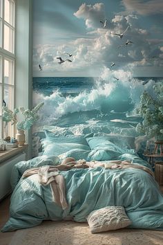 an ocean themed bedroom with seagulls flying in the sky and waves crashing on the bed