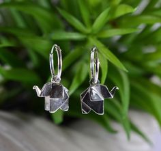 Pair Of Sterling Silver 925 Elephant Origami Style Dangly Earrings Comes in gift box for gift presentation use The dimensions of these earrings are  11  mm from top to the bottom and  15  mm from the left to the right The drop of these earrings is  23  mm The weight of these earrings is  5.2  grams per pair There is a  925  stamp on each earring They are hoop sleeper style earrings Brand new Gift Presentation, Sleeper Earrings, Dangly Earrings, Style Earrings, Toe Rings, Sterling Silber, Silver 925, Jewelry Earrings Dangle, Origami