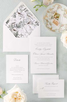 the wedding stationery is laid out and ready to be used