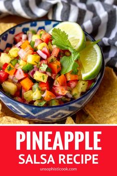 pineapple salsa in a blue and white bowl with tortilla chips on the side