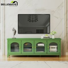 the television is mounted on the wall above the green cabinet with glass doors and metal handles