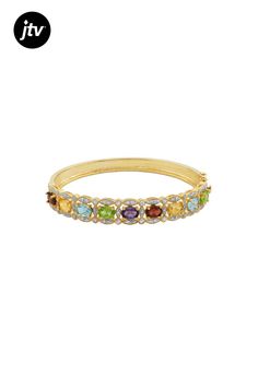 Oval Glacier Topaz���, Oval Citrine, Oval Peridot, Oval African Amethyst, Oval Garnet And Round White Diamonds 18k Yellow Gold Over Sterling Silver Bangle Bracelet Oval Gemstone Bangle In Fine Jewelry Style, Yellow Gold Multi-stone Oval Bracelet, Yellow Gold Multi-stone Oval Bracelets, Yellow Gold Oval Bracelet With Multi-stone, Yellow Gold Oval Multi-stone Bracelet, Oval Gemstone Accent Bracelets For Anniversary, Multicolor Gold Bracelet With Gemstones, Oval Anniversary Bracelets With Gemstone Accents, Yellow Gold Oval Bangle With Gemstone