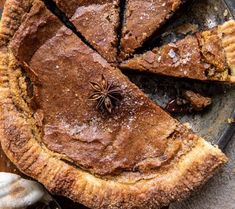 a chocolate pie with a bite taken out of it