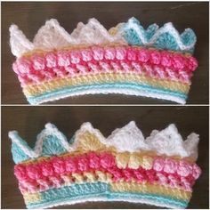 two crocheted crowns sitting on top of a wooden table