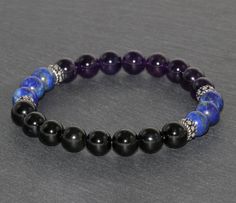 *Black Touurmaline, Lapis Lazuli and Amethyst Beaded Bracelet* IMPORTANT: ♥ Scientifically, Tourmaline is not a single mineral, but a group of minerals with related physical and chemical properties. Tourmaline belongs to a complex family of aluminum borosilicates mixed with magnesium, iron and other various metals that depending on the proportions and components, make up their color. Tourmaline occurs in all colors and is most well known for its pinks, reds, greens and blues, as well as its mult Black Amethyst 8mm Bead Bracelets, Black Amethyst Bracelets With 8mm Beads, Black Amethyst Bracelet With 8mm Beads, Black Amethyst Beaded Bracelets Spiritual, Black Amethyst Crystal Bracelet In Spiritual Style, Black Amethyst Beaded Bracelets, Black Amethyst Gemstone Beaded Bracelets, Spiritual Black Amethyst Beaded Bracelets, Black Amethyst Gemstone Bracelets