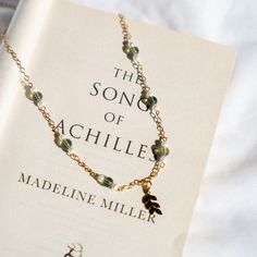 "He is half of my soul, as the poets say." Inspired by my favorite book, The Song of Achilles. This necklace is the perfect gift for a book loving, greek mythology obsessed friend! (or the perfect gift for yourself!) silver version here: https://www.etsy.com/listing/1421379757/as-the-poets-say-the-song-of-achillies?click_key=5d31eabf85f6350851596ad6bbb75121d82b459a%3A1421379757&click_sum=2346f018&ref=shop_home_active_1&frs=1&sts=1 made with golden or soft green glass beads and shell pearls, and The Song Of Achilles Jewelry, As The Poets Say, Greek Mythology Jewelry, Mythology Jewelry, The Song Of Achilles, Song Of Achilles, Necklaces Pearl, Pearl Necklaces, Jewelry Beaded