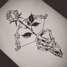 a drawing of a hand holding a rose with an arrow in the middle, on paper