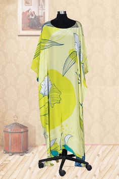 "Radiate sunshine wherever you go with our Yellow Embellished Silk Kaftan for women. Adorned with intricate embellishments and a captivating flower print, this kaftan effortlessly blends opulence with nature-inspired charm. Long Kaftan Dress For Women One size fits most 👉size Small to 8XL 👈 FABRIC * Silk  * Available Length 55\" (139.7cm) from shoulder to hem * Available Bust up to 55\" (139.7cm) * Available Waist up to 55\" (139.7cm) * Available Hips up to 55\" (139.7cm) This unique style of Kaftan and the delicate pattern on it, makes it perfect for you to get ready for your big day- with style and comfort! 👉CARE👈 * Hand washing recommended * Gentle machine wash 👉FREE SHIPPING" Yellow Printed Beachwear Kaftan, Silk Floral Print Floor-length Kaftan, Silk Kaftan With Floral Print For Beach Cover-up, Yellow Printed V-neck Kaftan, Long Kaftan Dress, Multicolor Floor-length Floral Print Kaftan, Long Kaftan, Beautiful Maxi Dresses, Silk Kaftan