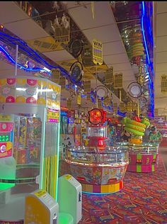 the inside of a toy store filled with lots of toys and vending machine machines