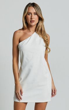 Channel your inner Greek goddess with the Mardelle Mini Dress. This stunning one-shoulder shift dress in crisp white linen will have you feeling like a summer dream. The asymmetric design adds a modern twist to this classic silhouette, while the sleeveless style keeps it effortlessly cool and perfect for those warm days or festival vibes. Whether you're heading to a casual brunch or dancing the night away, this shift dress is versatile enough to take you from day to night with ease. Embrace your Red Sequin Dress, Basic Black Dress, Neon Outfits, Bachelorette Dress, Spring Maxi Dress, Navy Bridesmaid Dresses, Long Sleeve Knit Dress, Sparkle Dress, Summer Dream